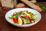 Crispy Bresaola or Quinoa Salad with cherry tomato, egg, cucumber served in dish isolated on table top view of arabian food