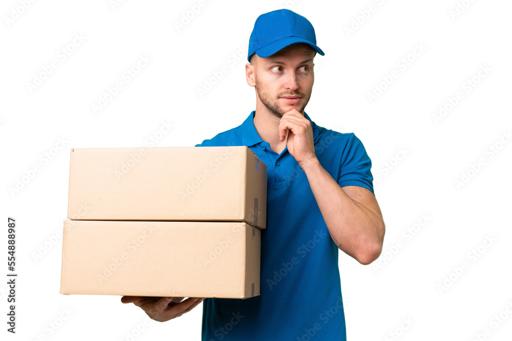 Delivery caucasian man over isolated background having doubts and thinking Delivery caucasian man over isolated background having doubts and thinking