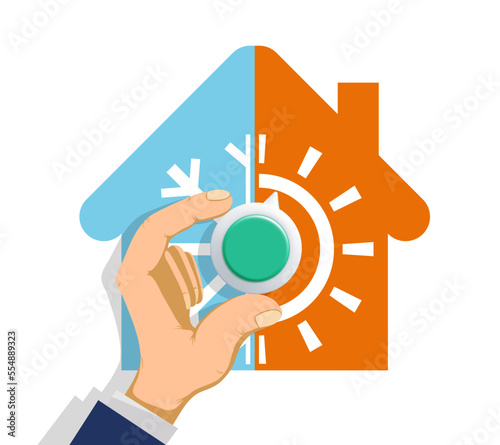 Man turns the climate control knob in the house