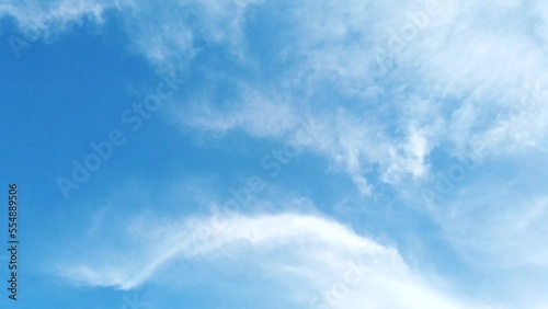 Time lapse white fluffy and beautiful cumulus clouds motion smoothly freedom  tranform many shapes on blue sky  in daytime beauty in  nature top view tropical cloudscape 