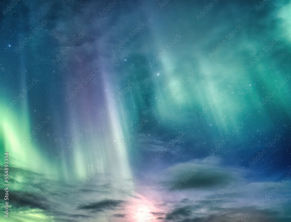 Beautiful Aurora borealis and starry glowing in the night sky on arctic circle