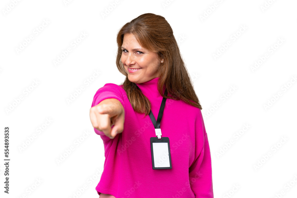 Middle-aged caucasian woman with ID card over isolated background pointing front with happy expression Middle-aged caucasian woman with ID card over isolated background pointing front with happy expression
