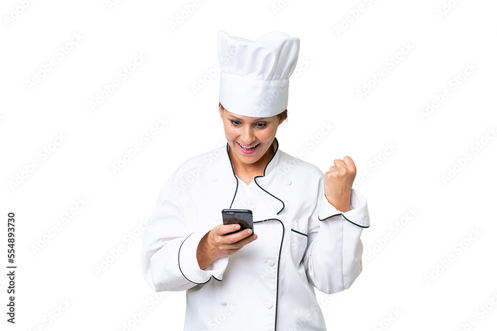 Middle-aged chef woman over isolated background surprised and sending a message Middle-aged chef woman over isolated background surprised and sending a message