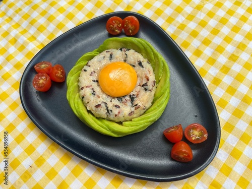 Onigiri with yolk and avocado