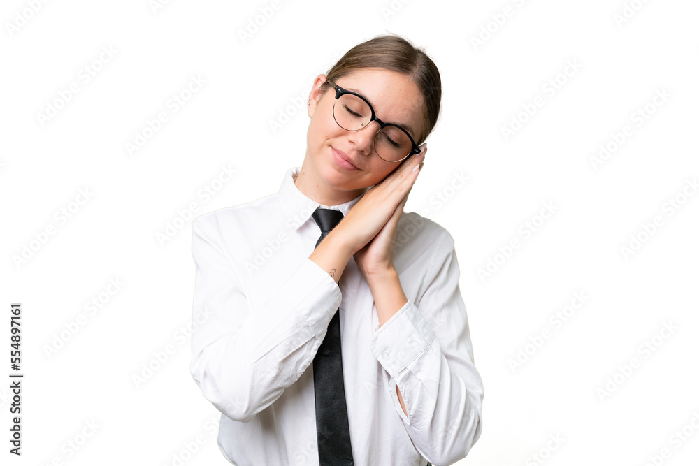 Young business caucasian woman over isolated background making sleep gesture in dorable expression Young business caucasian woman over isolated background making sleep gesture in dorable expression
