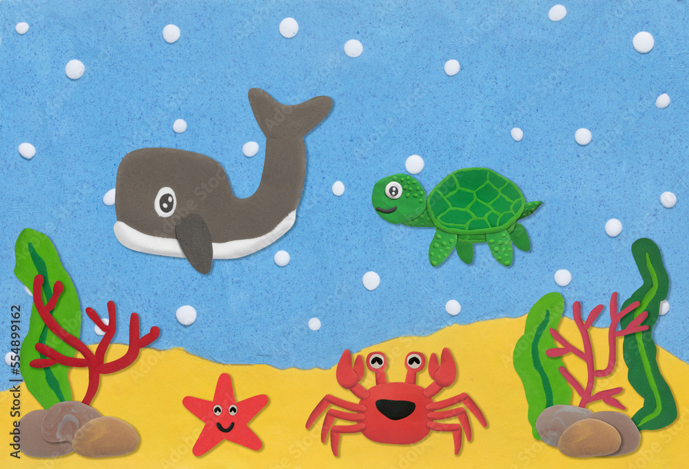 happy sea life animal made from plasticine on sand and sea under water background happy sea life animal made from plasticine on sand and sea under water background