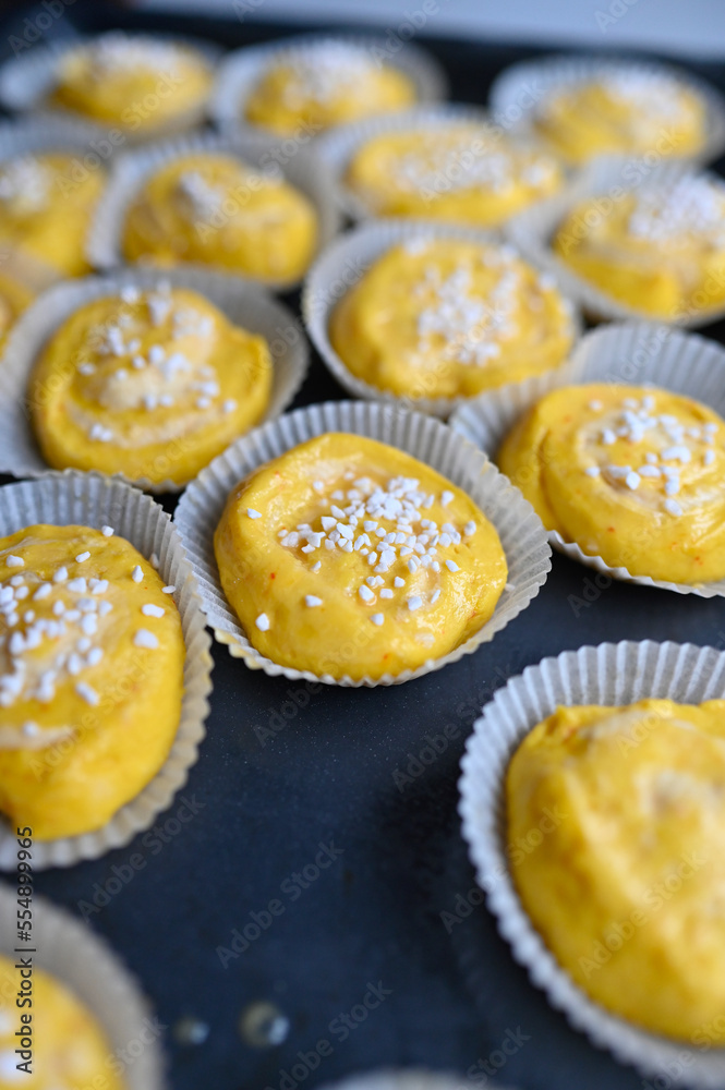 Yellow saffron buns with suger sprinkled on