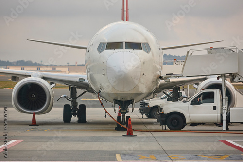Airplane refueling on the runaway. Transportation industry. Fuel supply