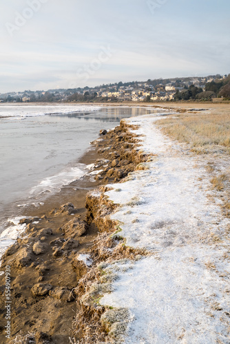 Snow on the shoreline at Grange over Sands, Cumbria UK