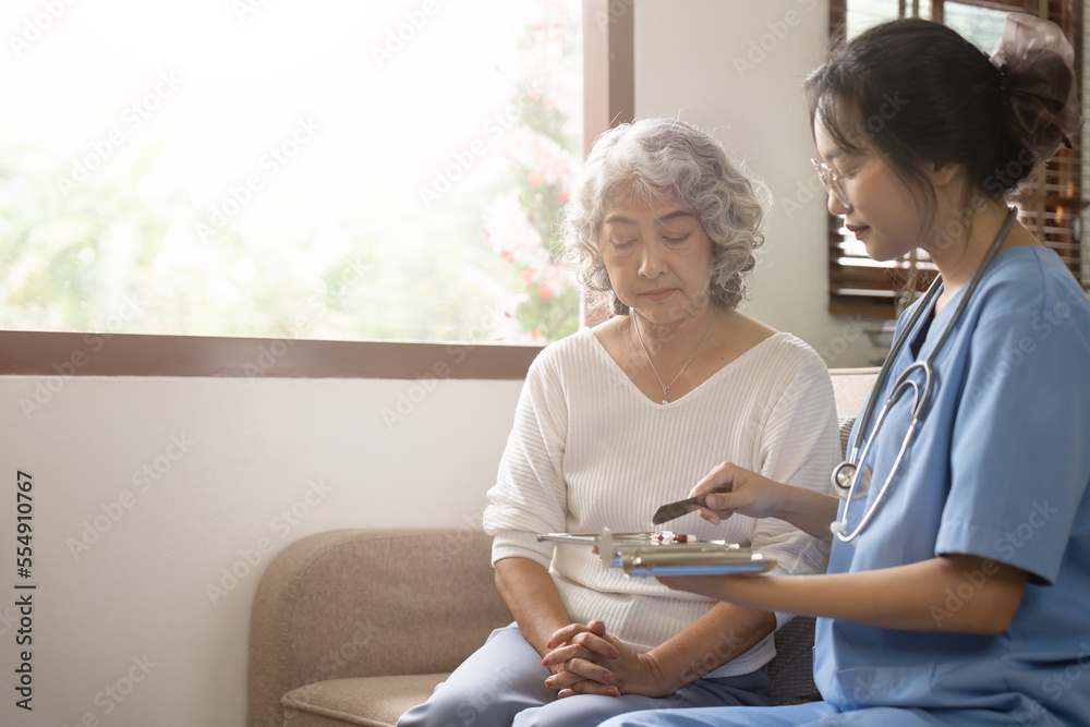 custom made wallpaper toronto digitalHealthcare worker or caregiver visiting senior woman indoors at home, explaining medicine dosage