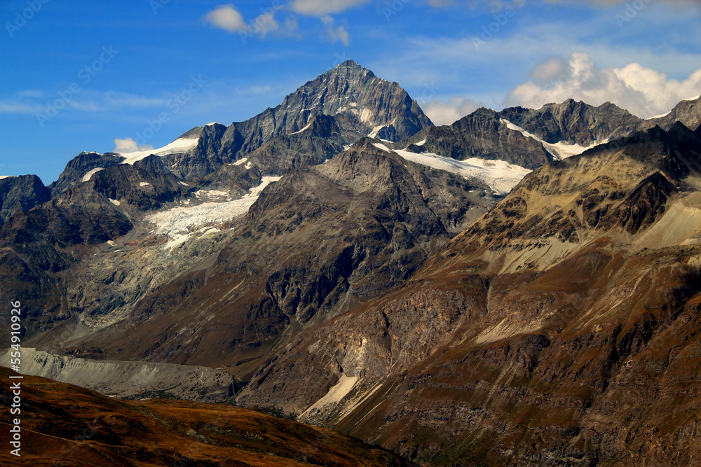 Landscape with mountain ranges with snow on the tops on a Mount Gornergrat, near Zermatt, in southern Switzerland	