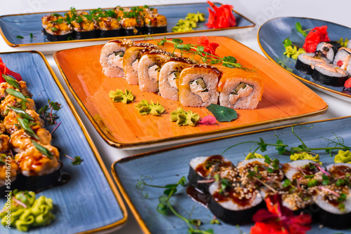 japanese cuisine, sushi rolls on a white background