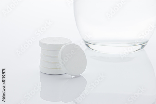 Aspirins grouped in a small column. photo
