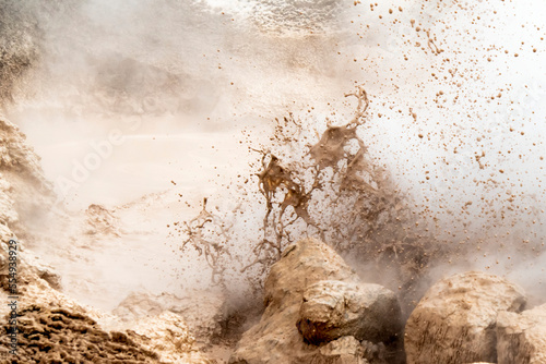 Close-up view of turbulent splashing of a mud pot in the Lower Geyser Basin; Yellowstone National Park, United States of America photo