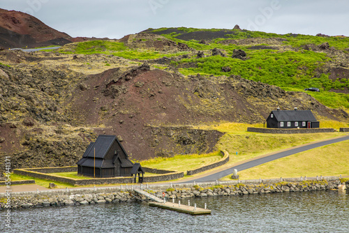 A small stave church in a remote island village. photo