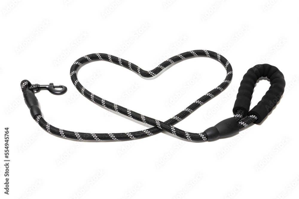 Black and gray dog leash, placed in the shape of a heart, isolated on a white background. Concept of love towards dogs.