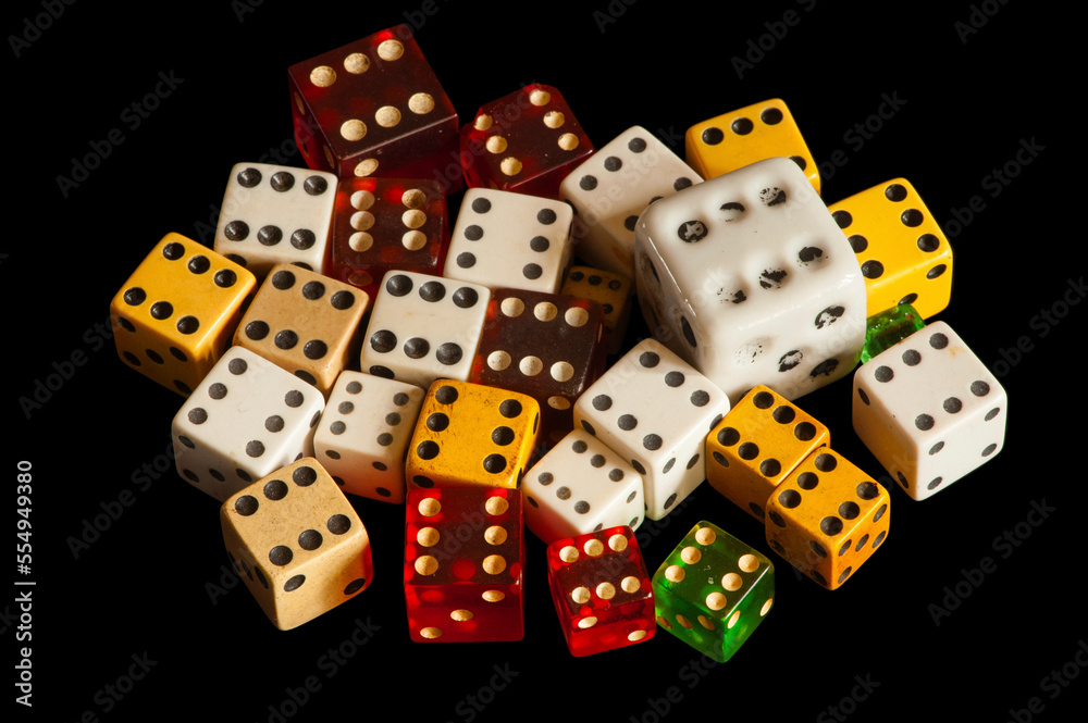 Studio image of dice on a black background; Studio Studio image of dice on a black background; Studio
