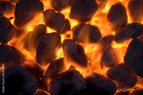 Close-up of coals on a campfire grill; Halsey, Nebraska, United States of America photo
