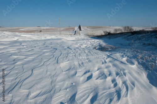 Road closed with drifted snow in Dunbar, Nebraska, USA; Dunbar, Nebraska, United States of America photo