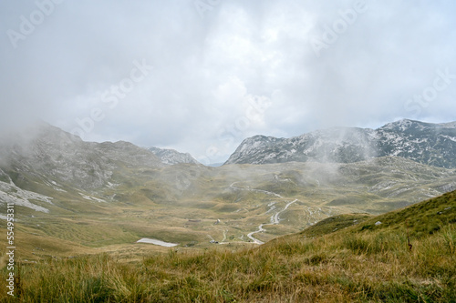 Fog and clouds on mountain in autumn. 