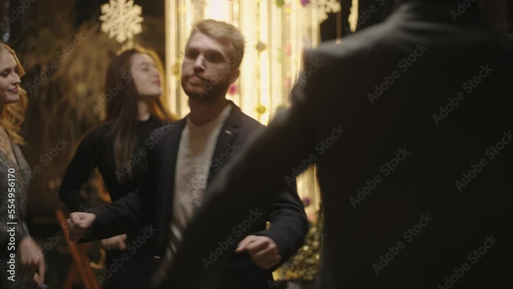 drunk man is dancing in corporate Christmas party, handsome male boss relaxing in New year night drunk man is dancing in corporate Christmas party, handsome male boss relaxing in New year night
