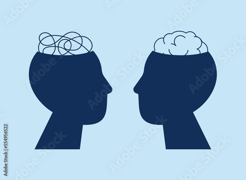 Psychology concept. Siduet of a two male heads with a brain and a tangled tangle of thoughts