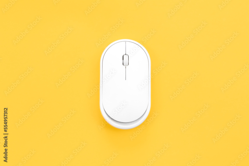 Computer mouse on a yellow background isolated, flat lay. Computer mouse on a yellow background isolated, flat lay.
