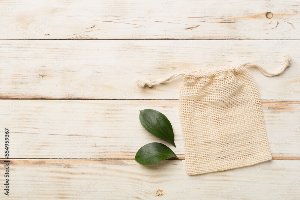 Small eco sack on color background. Top view. Small eco sack on color background. Top view.