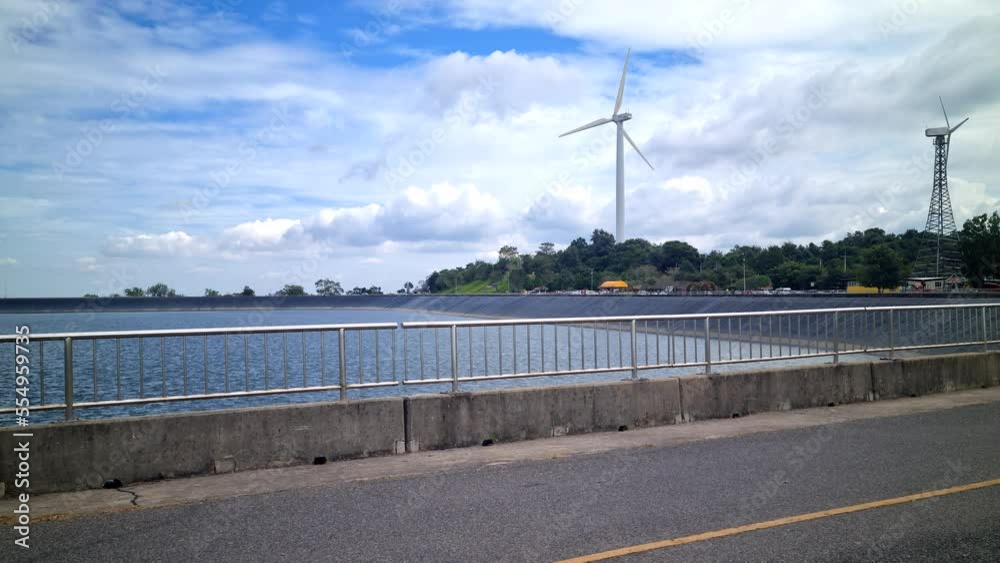 Road, big swamp and turbine in the landscape scene innovation on Thailand mountain with sky background. Road, big swamp and turbine in the landscape scene innovation on Thailand mountain with sky background.