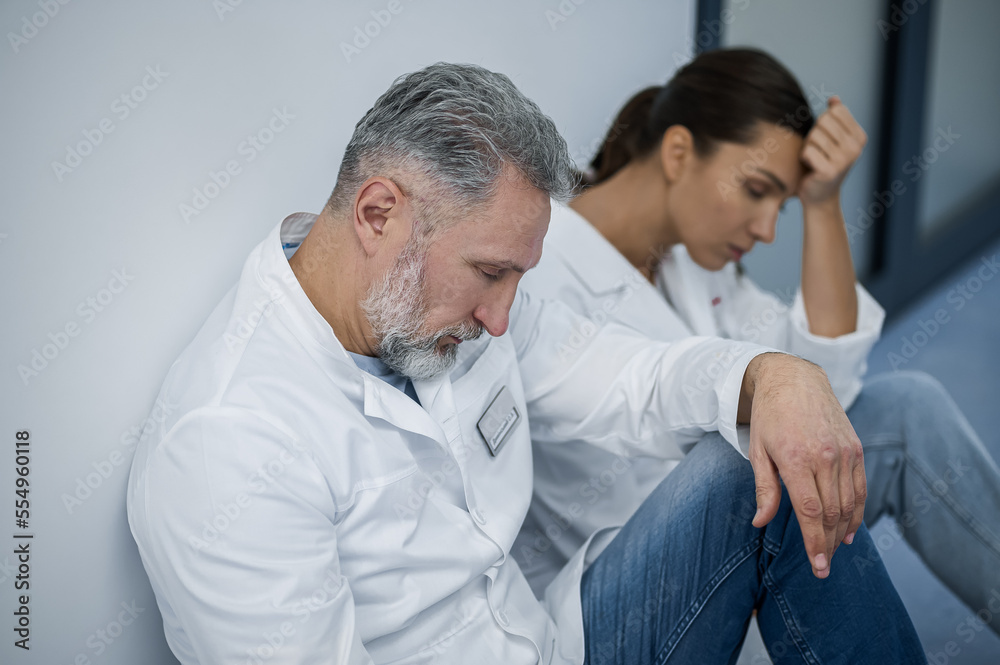 Doctors feeling exhausted after the hard shift