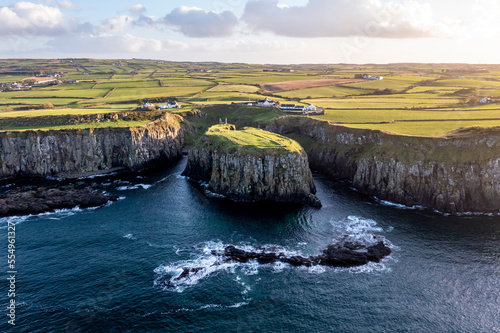 Dunseverick Castle is located west of the village of Dunseverick, in County Antrim, in Northern Ireland.