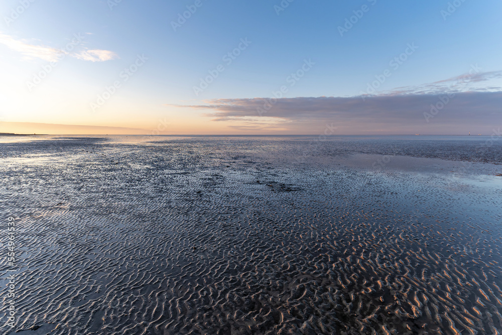 Wadden Sea in Cuxhaven, Germany at sunset