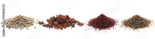 Set spice pile, white peppercorns, star anise, ground sumac, anise seeds isolated on white, side view