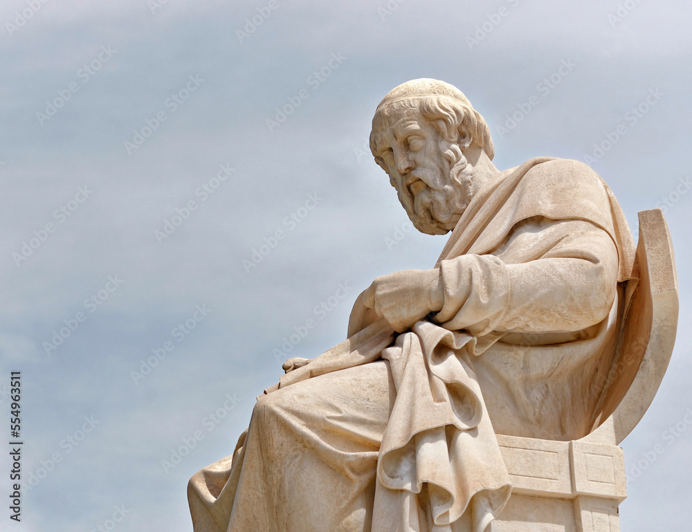 Fototapeta premium Plato the ancient Greek philosopher's marble statue. Culture travel in Athens, Greece.