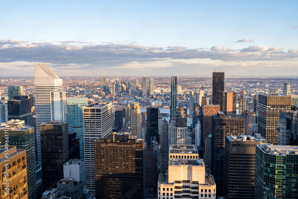 Fototapeta premium Elevated View of Midtown Manhattan Looking East Towards Long Island City in Queens New York at Sunset