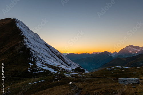 sunrise over the snowy mountains during spring (Carschinahütte, Grisons, Switzerland)
