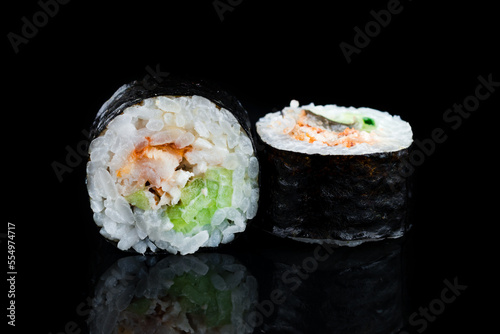 Japanese cuisine maki sushi rolls with sea bass, cream cheese and cucumber. photo