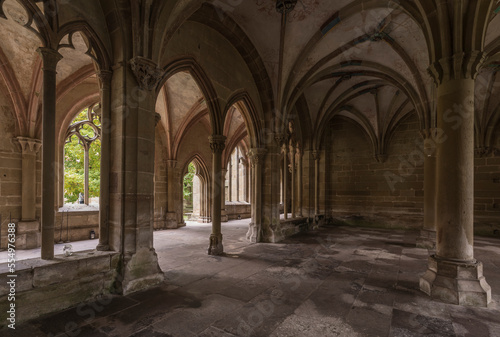 Aisle of a historic monastery.