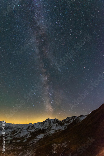 starry night sky with the milkyway in the alps (Austria)