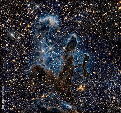 Details show of the Pillars of Creation, in Eagle Nebula. Digitally enhanced. Elements of image furnished by NASA