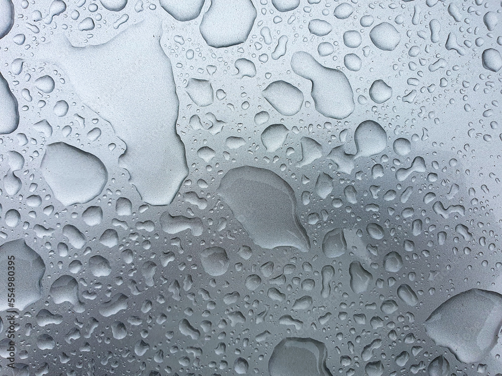 Water drops on background texture. backdrop glass covered with drops of water. bubbles in water Water drops on background texture. backdrop glass covered with drops of water. bubbles in water