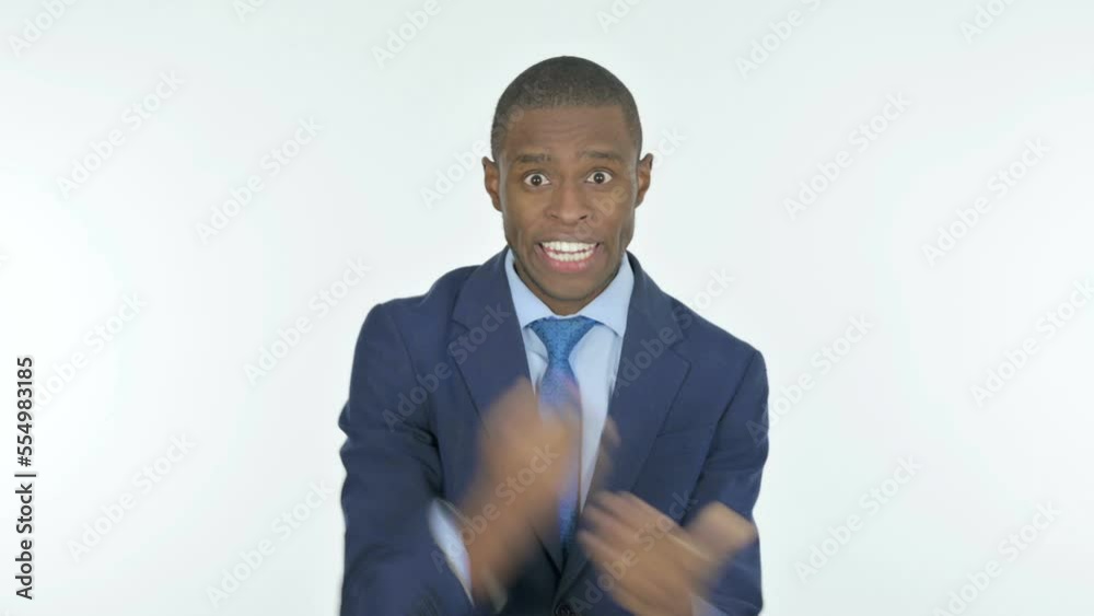 Angry African Businessman Arguing on White Background Angry African Businessman Arguing on White Background