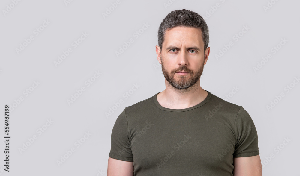 caucasian man with stubble in studio with copy space. photo of caucasian man with stubble caucasian man with stubble in studio with copy space. photo of caucasian man with stubble