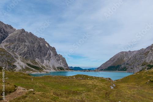 L  nersee in the Austrian Alps with snowy slopes