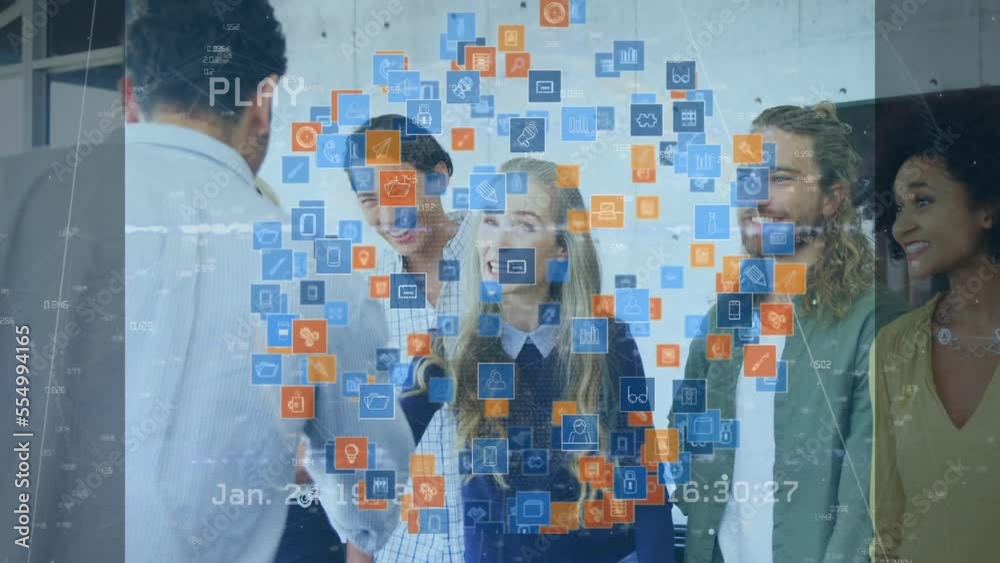 Animation of media icons over happy diverse business people in office Animation of media icons over happy diverse business people in office