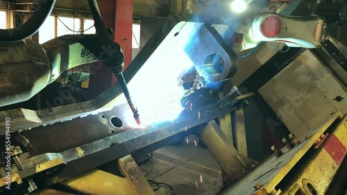 Welding metal, a lot of bright sparks when welding