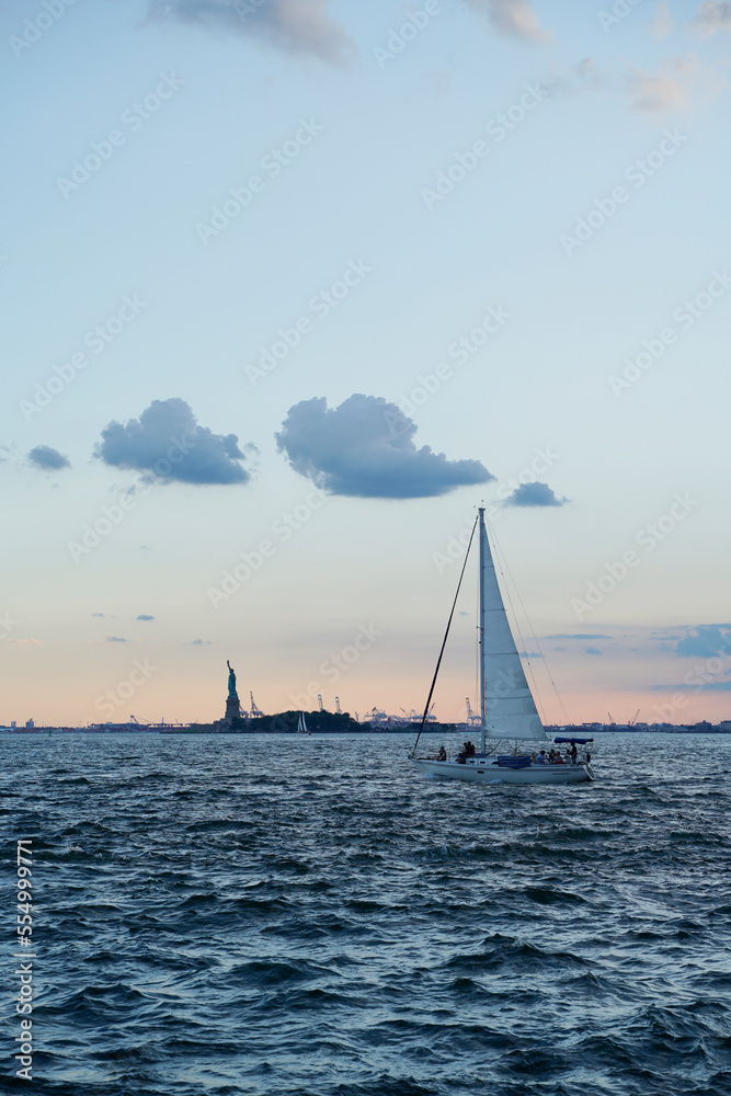 sailing and statute view from Manhattan