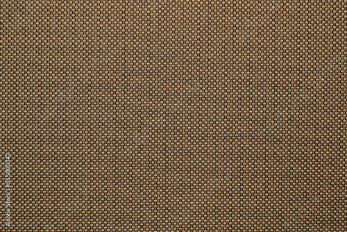 Texture and background of upholstery fabric in brown color. Fabric sample texture as background and design element. Fabric texture for sofa