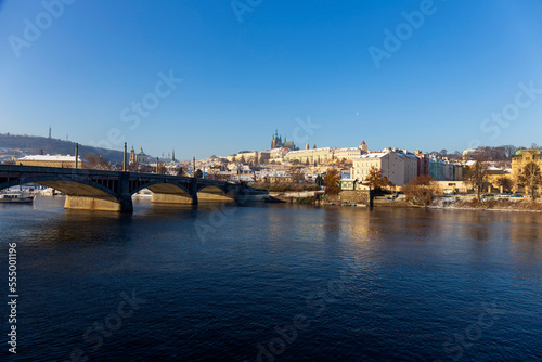 Snowy Prague Lesser Town with Prague Castle above River Vltava in the sunny Day , Czech republic © Kajano