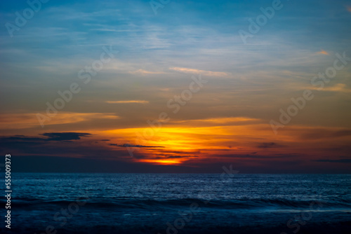 Sunset over the sea with colorful sky